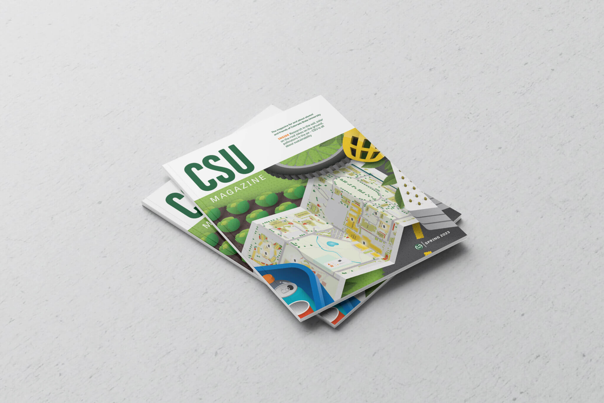 A mockup of the CSU Magazine cover with a custom illustrated map amongst sustainable items